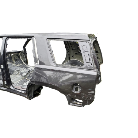 P2 CADILLAC ESCALADE IV 2014 - BŁOTNIK TYLNY TYŁ LEWY KRÓTKI POSZYCIE U121V